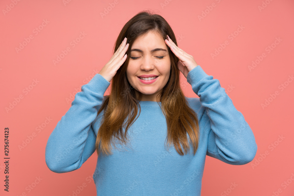 Young girl with blue sweater unhappy and frustrated with something. Negative facial expression