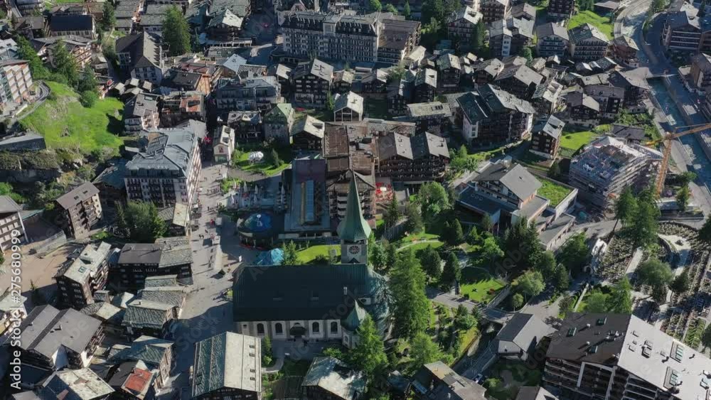 Aerial view of Zermatt, town under famous mountain Matterhorn, turn of spring and summer - landscapes of Swiss Alps from above, Switzerland, Europe Aerial view of Zermatt, town under famous mountain Matterhorn, turn of spring and summer - landscapes of Swiss Alps from above, Switzerland, Europe