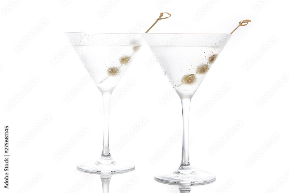 Classic Dry Martini with olives isolated on white background