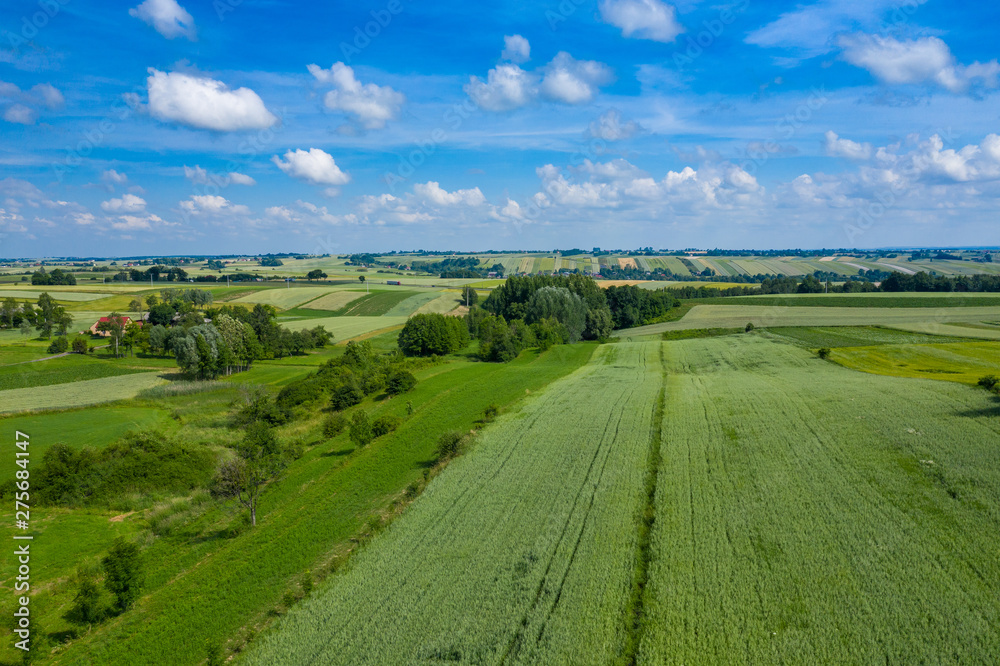 Aerial view of farmlands and mountains in rural Poland seen from drone. Summer time. Aerial view of farmlands and mountains in rural Poland seen from drone. Summer time.