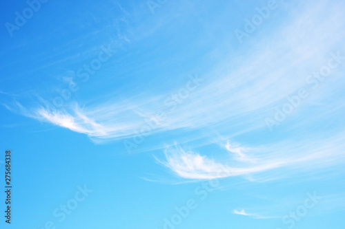 Close-up of light clouds against a clear blue shaded sky background  Italy 