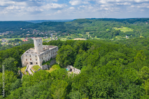 Fototapeta Naklejka Na Ścianę i Meble -  Aerial view of Lipowiec castle.. Historic castle Lipowiec and antique building museum. The ruins of the top of the mountain. Summer time.