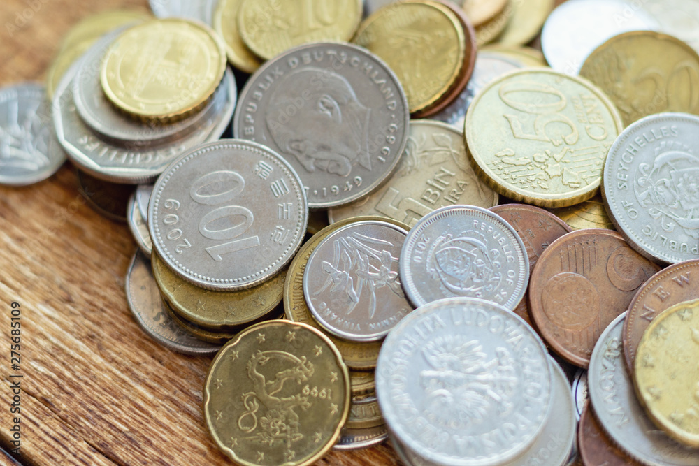 coins old rusty brass euro Seychelles Bulgaria China Germany pile pack heap stack on a wooden background finance economy investment savings concept mock up selective focus close up coins old rusty brass euro Seychelles Bulgaria China Germany pile pack heap stack on a wooden background finance economy investment savings concept mock up selective focus close up
