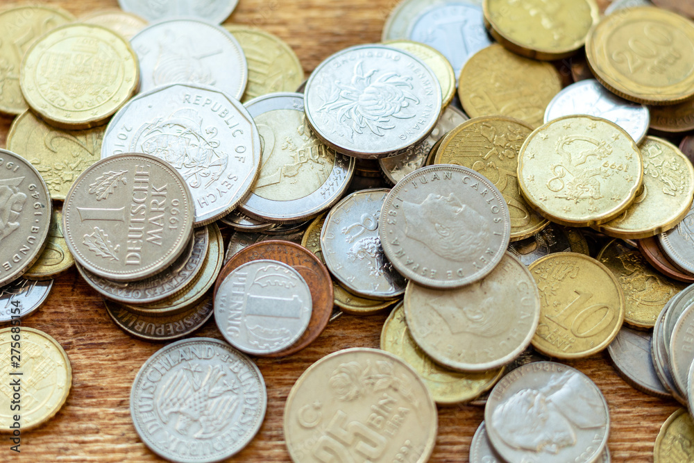 coins old rusty brass euro Seychelles Bulgaria China Germany pile pack heap stack on a wooden background finance economy investment savings concept mock up selective focus close up coins old rusty brass euro Seychelles Bulgaria China Germany pile pack heap stack on a wooden background finance economy investment savings concept mock up selective focus close up