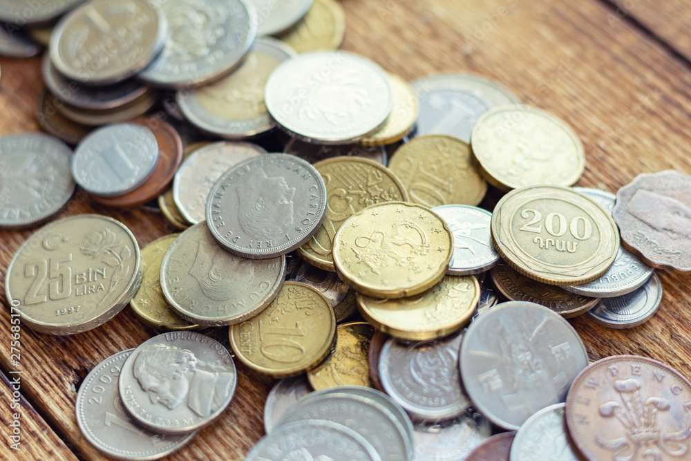 coins old rusty brass euro Seychelles Bulgaria China Germany pile pack heap stack on a wooden background finance economy investment savings concept mock up selective focus close up coins old rusty brass euro Seychelles Bulgaria China Germany pile pack heap stack on a wooden background finance economy investment savings concept mock up selective focus close up