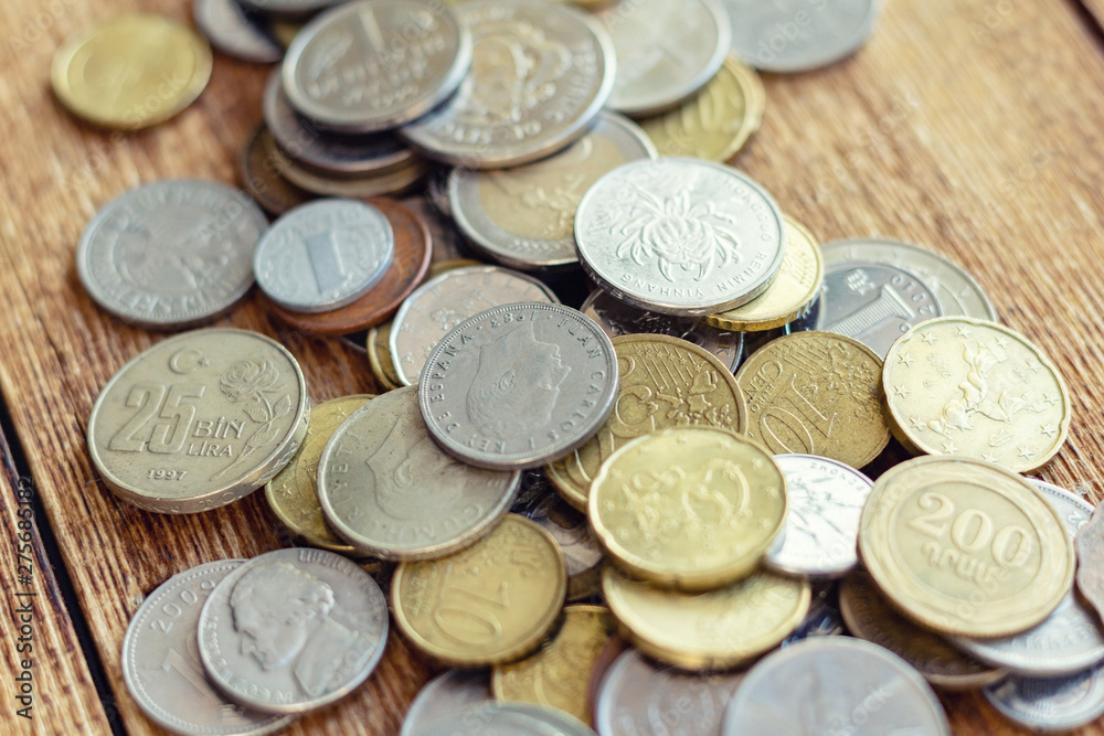 coins old rusty brass euro Seychelles Bulgaria China Germany pile pack heap stack on a wooden background finance economy investment savings concept mock up selective focus close up coins old rusty brass euro Seychelles Bulgaria China Germany pile pack heap stack on a wooden background finance economy investment savings concept mock up selective focus close up