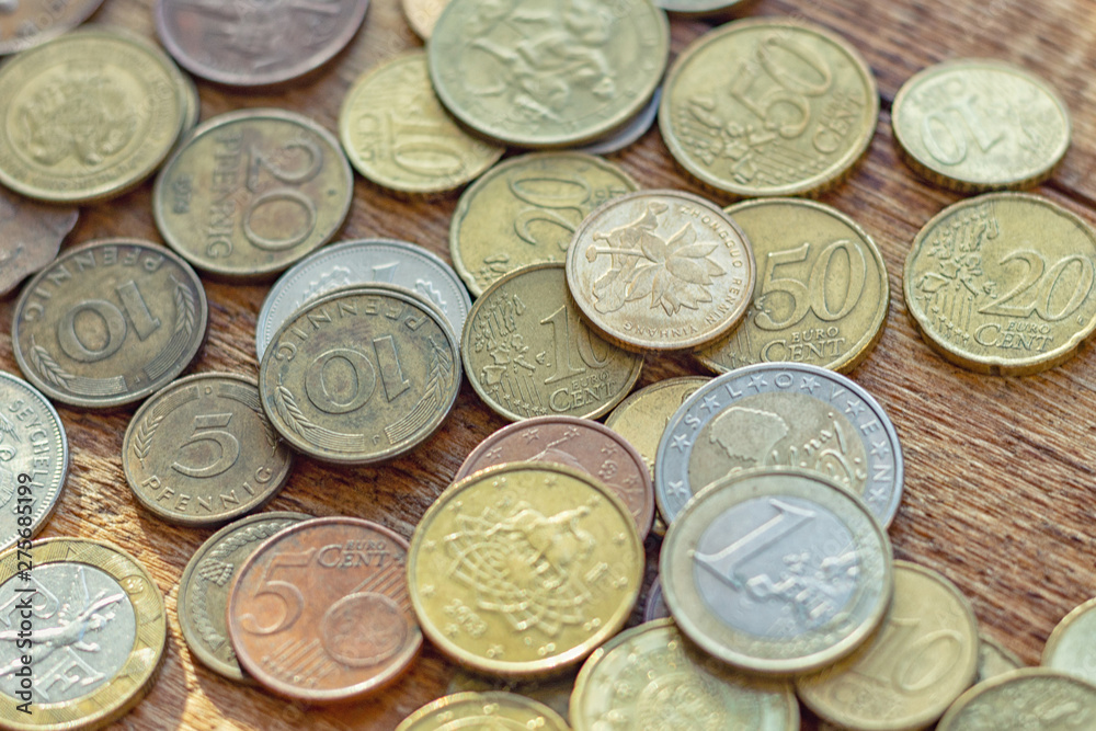 coins old rusty brass euro Seychelles Bulgaria China Germany pile pack heap stack on a wooden background finance economy investment savings concept mock up selective focus close up coins old rusty brass euro Seychelles Bulgaria China Germany pile pack heap stack on a wooden background finance economy investment savings concept mock up selective focus close up