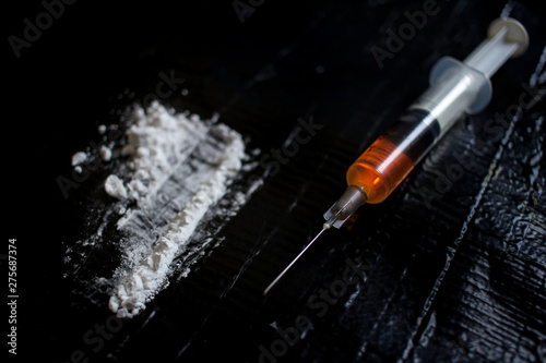 Konstfotografi Drug abuse dangerous drugs cocaine heroin heroine addiction concept black backgr