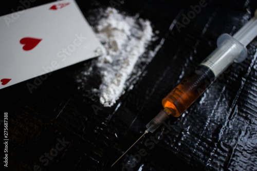 Konstfotografi Drug abuse dangerous drugs cocaine heroin heroine addiction concept black backgr