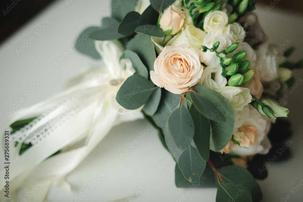 Obraz premium beautiful Wedding bouquet, wedding floristry. Stylish wedding bouquet bride. Close up. Side view. Wedding decor. Artwork.