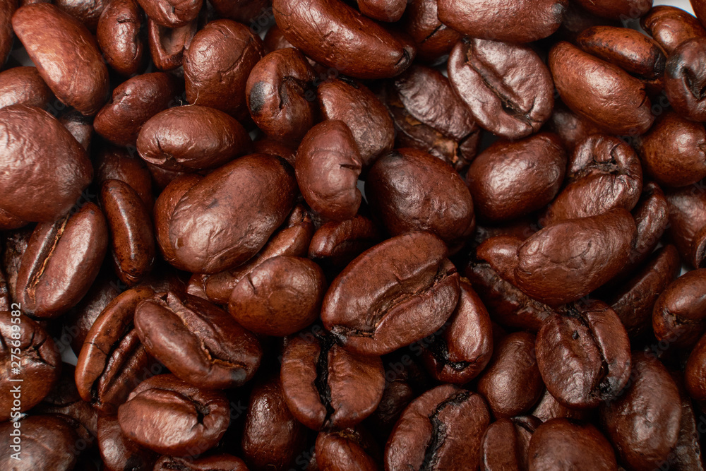 aromatic roasted coffee beans on white background aromatic roasted coffee beans on white background