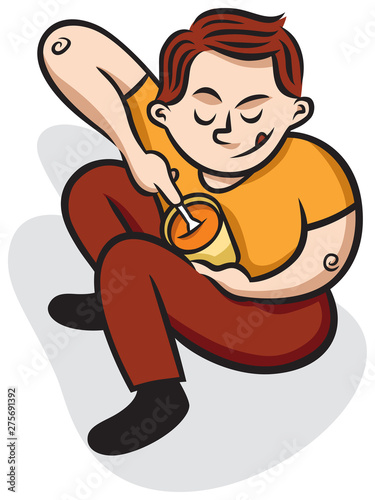 A boy digs into a pint of ice-cream