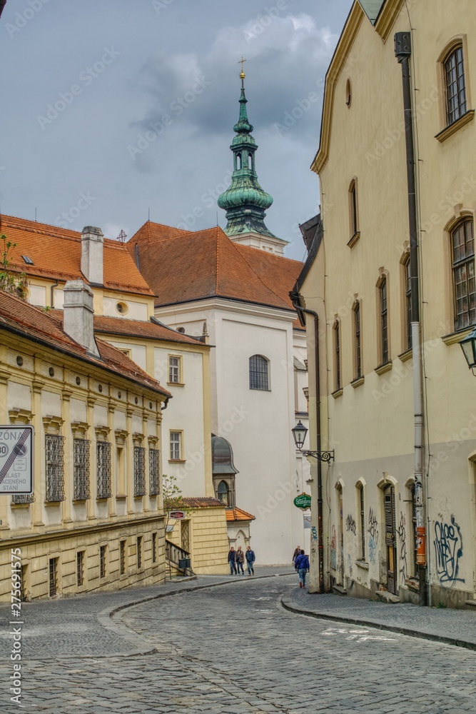 alleys of the old town in Brno, cobbled, winding streets on the hill, tourists visiting the city rich in monuments, churches and souvenirs of famous residents