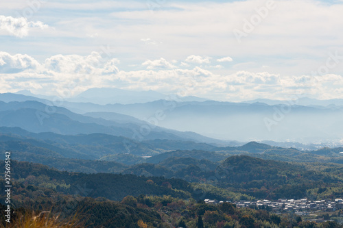 Clouds under a Nara city in Japan from the hill in sunny dayNara city in Japan from the hill in sunny day