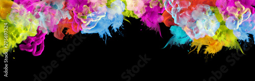 Acrylic colors in water. Ink blot. Abstract black background. Horizontal long banner.