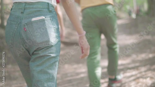 back view woman traveler walking slow motion