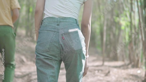 back view woman traveler walking slow motion