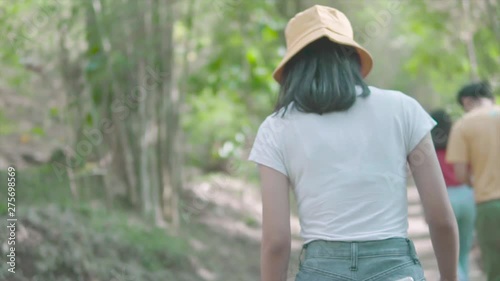 back view woman traveler walking slow motion