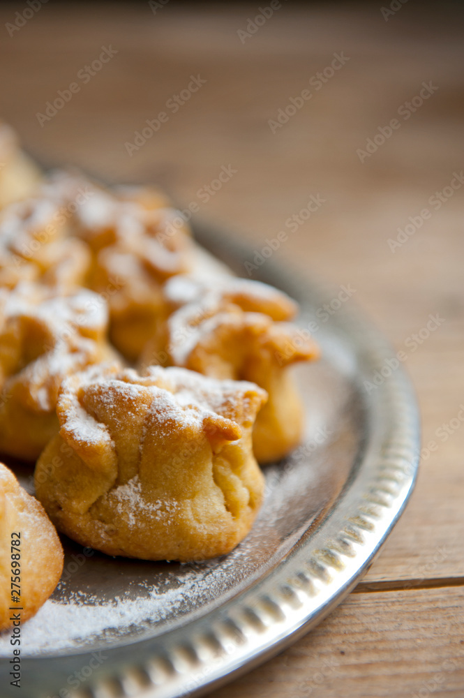 Homemade biscuit with violet hyacinth, white flower and yellow taraxacum on the wooden table Homemade biscuit with violet hyacinth, white flower and yellow taraxacum on the wooden table