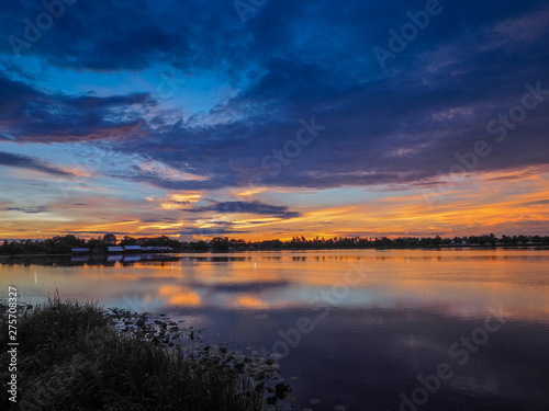 Lake view morning scenic above lotus lake with cloudy sky background, sunrise at Krajub Reservoir, Ban Pong, Ratchaburi, Thailand.