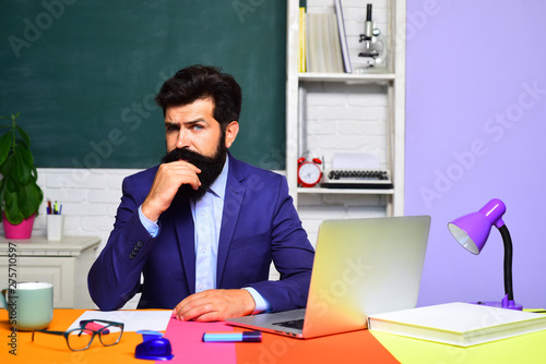 Preparing for exam in college. Portrait of male university student indoors. Knowledge day. Student and tutoring education concept. Teacher preparing for university exams. Teachers day. Young teacher.