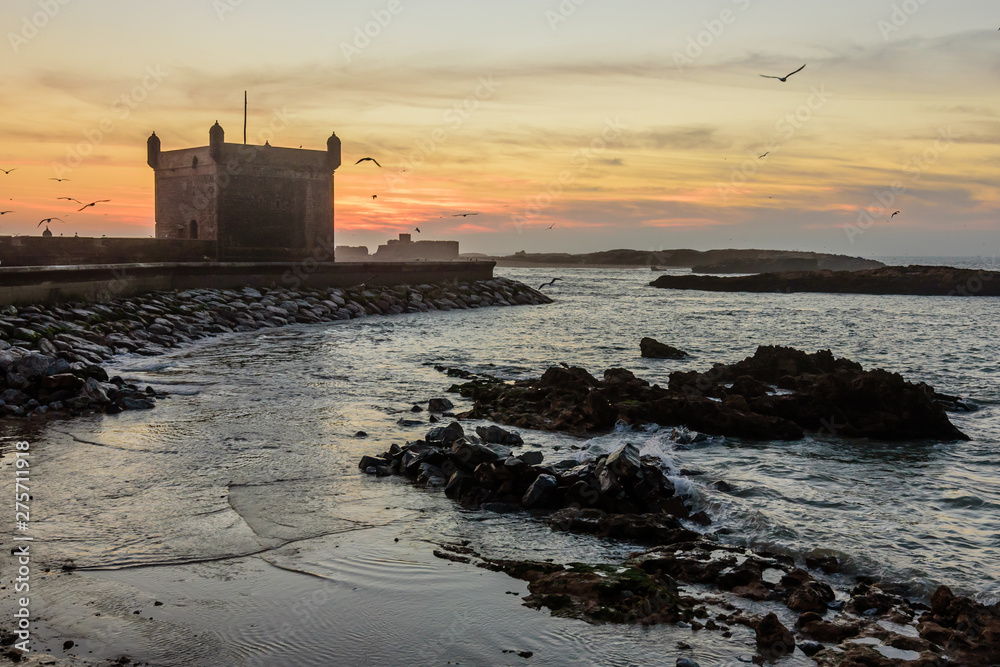 Sightseeing of Morocco. Beautiful sunset in Essaouira port.