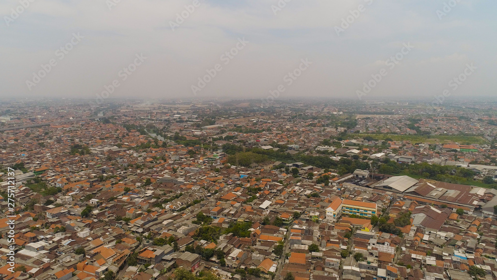 Aerial cityscape densely built asian city. modern city Surabaya with buildings and houses. Surabaya capital city east java, indonesia
