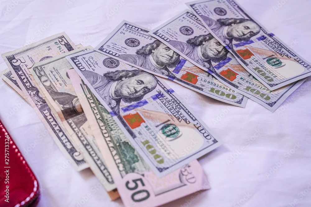 Money from america. Notes of Real, USA Dollars currency. Concept of economy, inflation and business. Wallet with money banknotes background. Money from america. Notes of Real, USA Dollars currency. Concept of economy, inflation and business. Wallet with money banknotes background.