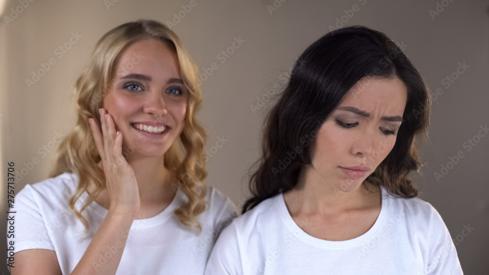Female enjoying reflection in mirror, upset friend dislike herself, complex Female enjoying reflection in mirror, upset friend dislike herself, complex