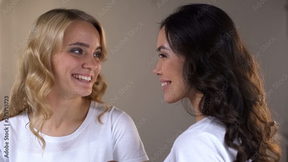 Two adorable women with bright evening make-up ready for party, beauty tips