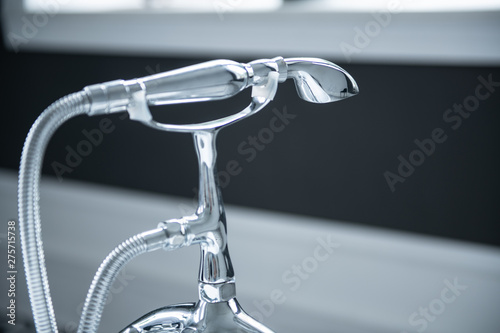 classic silver bathtub mixer with cold and hot water