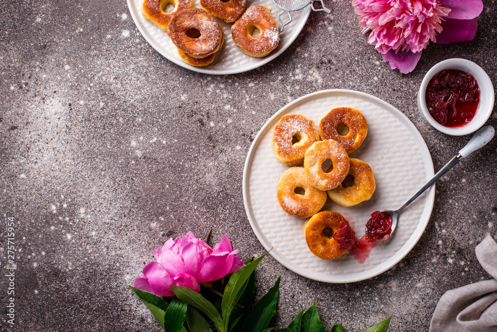 Homemade donuts with rose jam