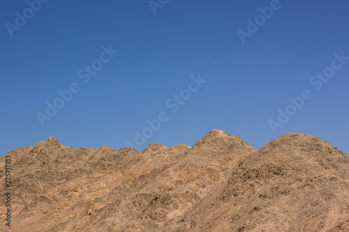 desert mountain ridge nature scenery landscape background horizon line board with empty blue sky, copy space for text