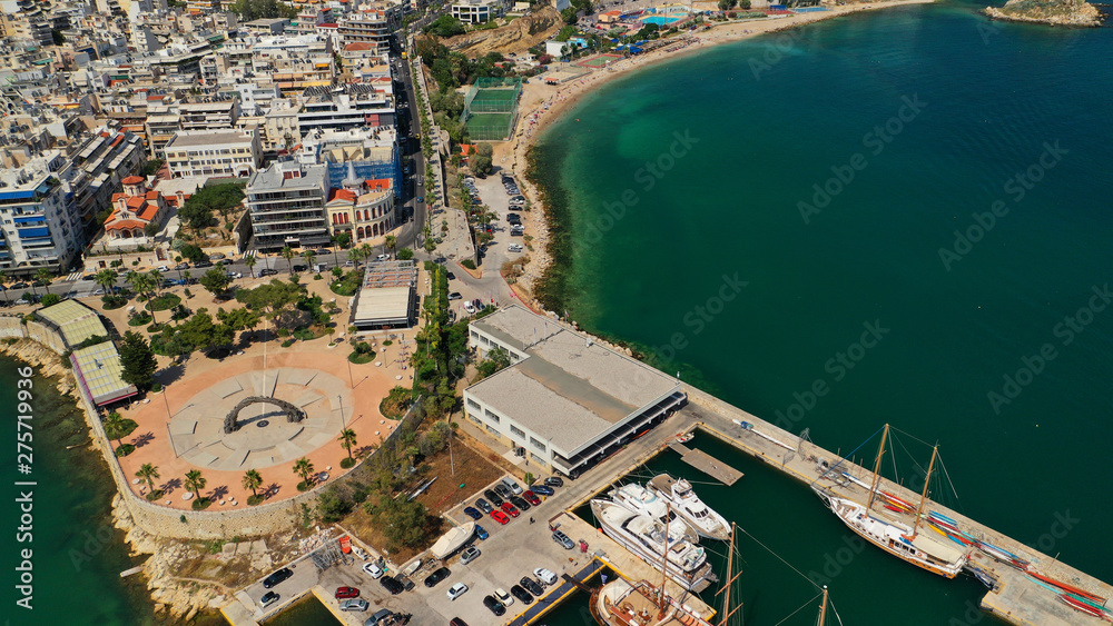 Aerial drone panoramic photo of famous port round port of Mikrolimano and Zea or Passalimani with luxury yachts docked and famous port of Piraeus as seen from great altitude, Piraeus, Attica, Greece