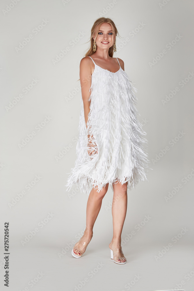 Pretty woman beautiful face bright makeup long blond hair fashion model wear trend clothes for date party summer walk travel cruise collection organic silk cotton dress accessory jewelry white studio. Pretty woman beautiful face bright makeup long blond hair fashion model wear trend clothes for date party summer walk travel cruise collection organic silk cotton dress accessory jewelry white studio.