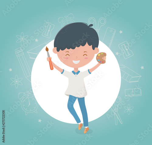 little student boy with school supplies