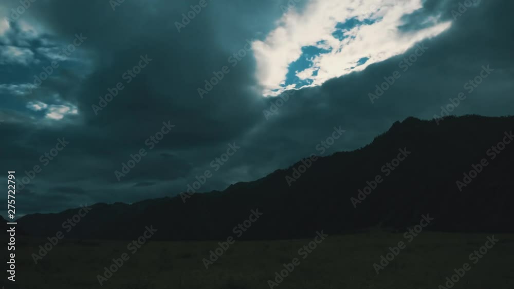 Beautiful aerial timelapse in the mountains. Clouds float across the sky. Nature in Russia, Altai. Highlands Landscape during a vibrant cloudy summer day. on 4k video. Beautiful aerial timelapse in the mountains. Clouds float across the sky. Nature in Russia, Altai. Highlands Landscape during a vibrant cloudy summer day. on 4k video.