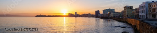 Beautiful Panoramic view of the Old Havana City, Capital of Cuba, during a colorful cloudy sunrise. © edb3_16