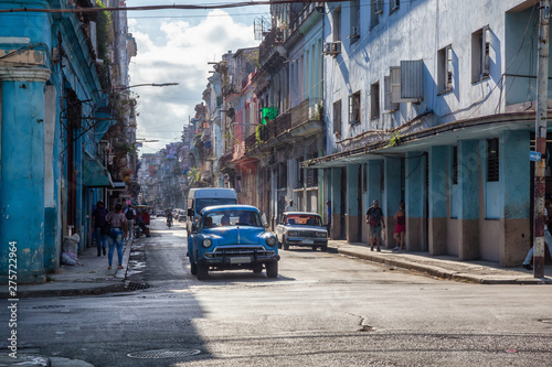 Street view of the Old Havana City, Capital of Cuba, during a vibrant and bright sunny morning. © edb3_16