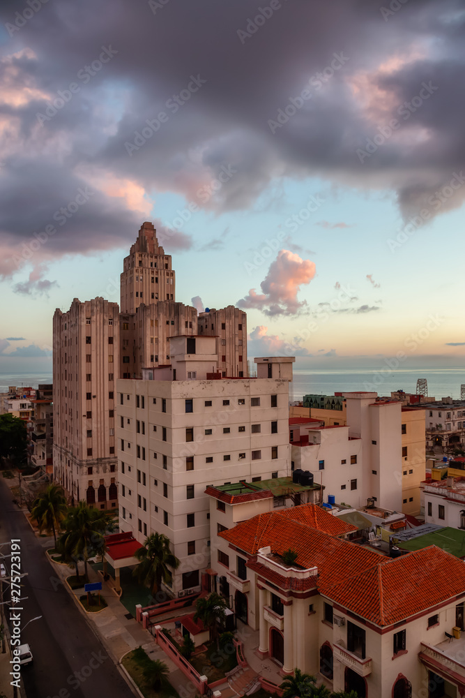 Aerial view of the Havana City, Capital of Cuba, during a colorful cloudy sunrise.