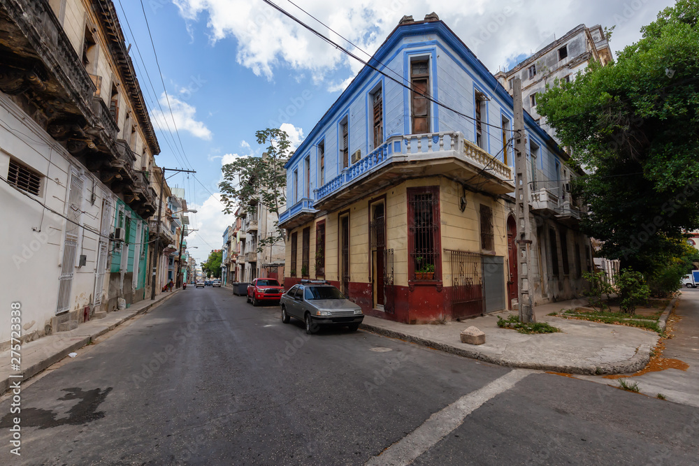 Residential Street view of the Old Havana City, Capital of Cuba, during a bright and sunny day.