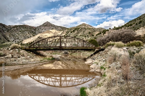 A bridge over Sevier River at Caboose Village in Sevier Utah, USA photo