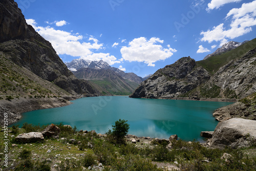 Fototapeta Naklejka Na Ścianę i Meble -  Fan Mountains in Tajikistan are one of Central Asia is premier trekking destination. The beautiful seven lake trek from Penjikent. View on the lake number six
