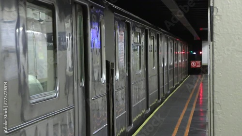 Underground subway station leaving platform