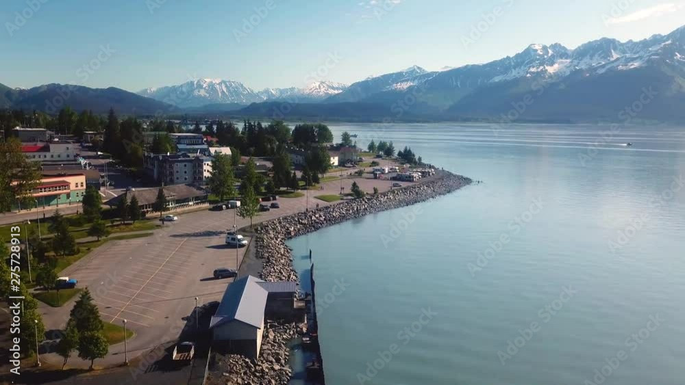 Drone aerial flight over the waterfront of Seward Alaska; visible in