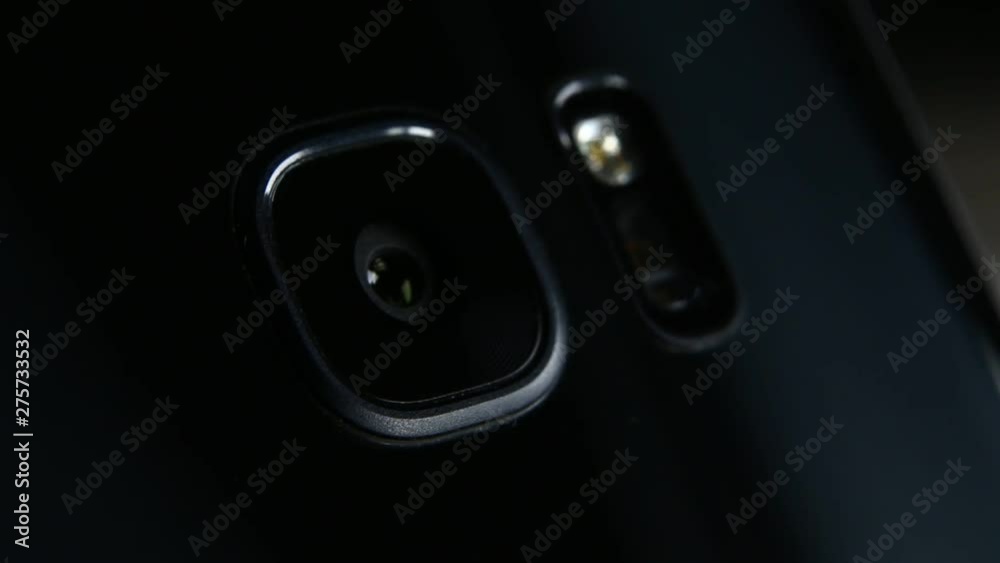 Macro close up of a smartphone camera lens on back Macro close up of a smartphone camera lens on back