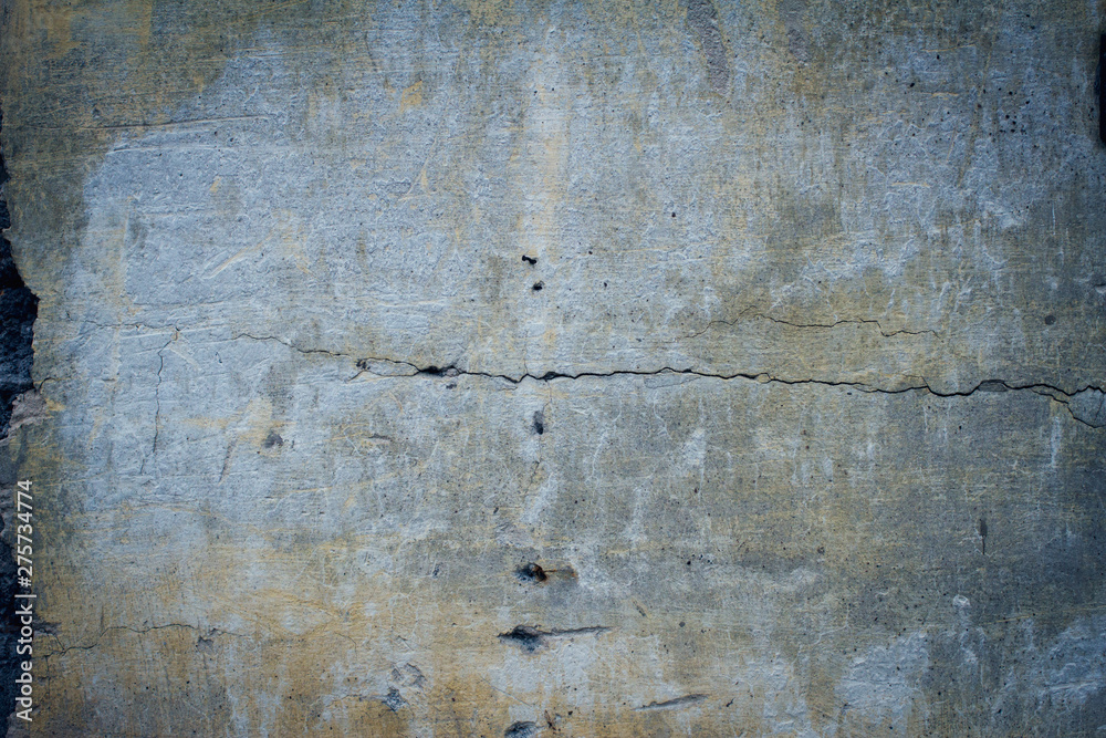 Cracked concrete texture closeup background Cracked concrete texture closeup background