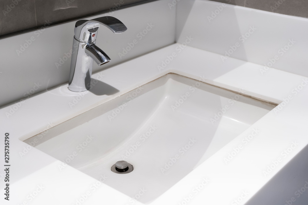 Modern faucet with wash basin sink counter bathroom interior contemporary