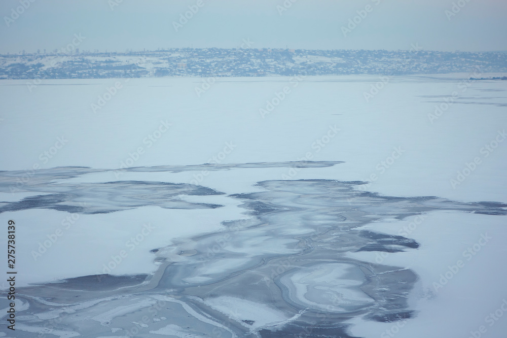 Obraz premium winter season , frozen lake ice background 