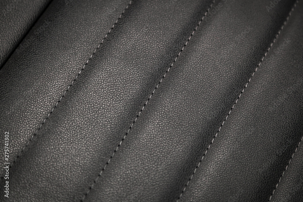 close-up black perforated leather car seat. Skin texture Stock Photo |  Adobe Stock